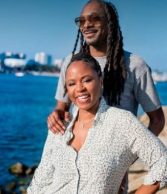 Laurie Holmond ex-boyfriend Snoop Dogg with his wife Shante.